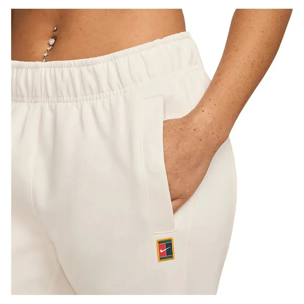 Women's Court Dri-FIT Heritage Windrunner Poly Knit Pant Pale Ivory-Apparel-Nike-FZ6509-110U25-1-Tennis Express